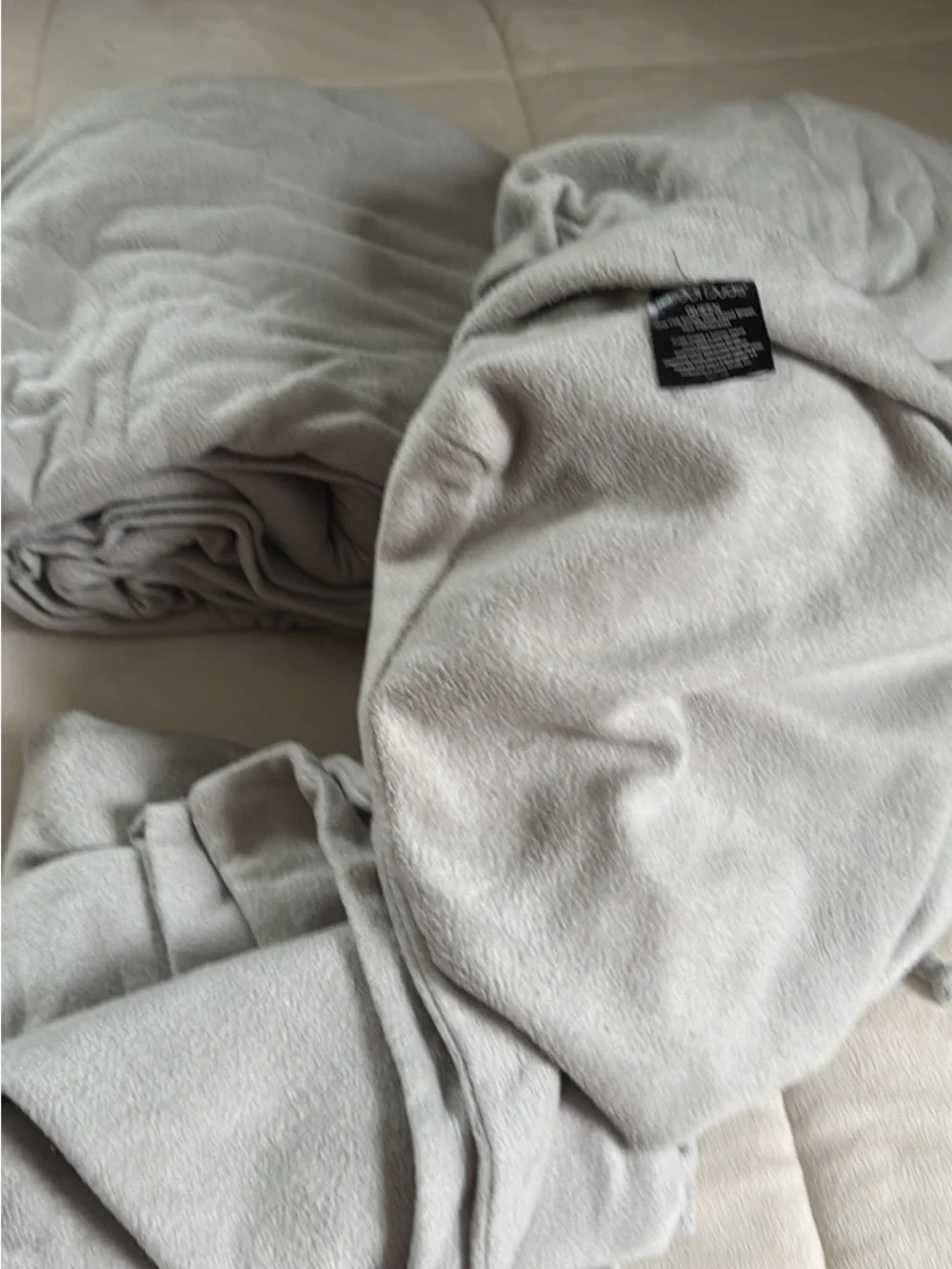 Cuddl Duds Plush Blanket in Light Gray with Black Tag